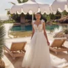Robe de mariée trapèze avec fleurs en 3d de tulle