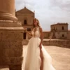 Robe de mariée trapèze dentelle effet tatouage et dos nu plongeant